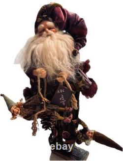 VTG Santa Claus Figurine holding two small elf figures Whimsical Rare