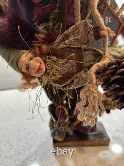 VTG Santa Claus Figurine holding two small elf figures Whimsical Rare