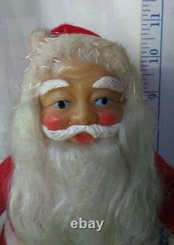Vintage 10 inch plastic faced Santa Clause