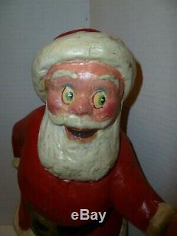 Vintage 13 inch paper-mache Santa Claus thought to be a store display piece