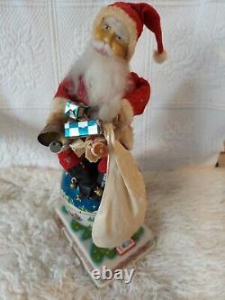Vintage HTC Japan Rotating Santa Claus on Globe world Tin 15