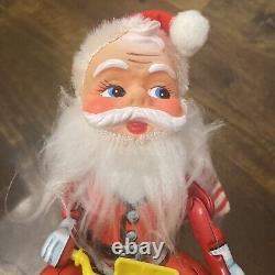 Vintage Santa Claus on Scooter Tin Litho Battery Operated Christmas Toy With Box