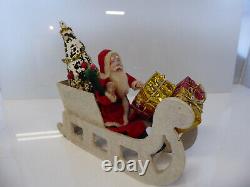 Vintage Santa in Vintage Sleigh with Tree and Xmas Packages