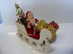 Vintage Santa in Vintage Sleigh with Tree and Xmas Packages