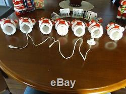 Vintage lot of 7 1950s Harett-Gilmar Light Up Santa Claus Candy Holder Banks