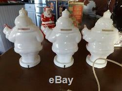 Vintage lot of 7 1950s Harett-Gilmar Light Up Santa Claus Candy Holder Banks