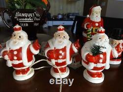 Vintage lot of 7 1950s Harett-Gilmar Light Up Santa Claus Candy Holder Banks