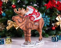 Wooden carved Santa Claus figurine riding a moose, Christmas gift home decor