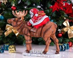 Wooden carved Santa Claus figurine riding a moose, Christmas gift home decor