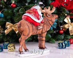 Wooden carved Santa Claus figurine riding a moose, Christmas gift home decor