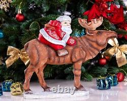 Wooden carved Santa Claus figurine riding a moose, Christmas gift home decor