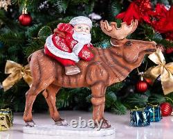 Wooden carved Santa Claus figurine riding a moose, Christmas gift home decor