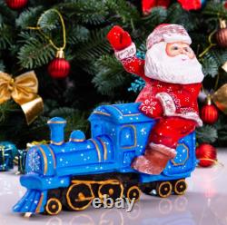 Wooden hand carved Santa Claus Figurine riding a train, Christmas home decor
