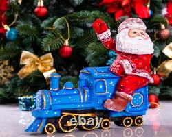 Wooden hand carved Santa Claus Figurine riding a train, Christmas home decor