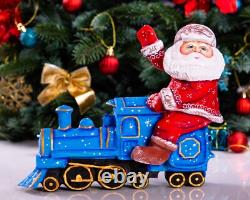 Wooden hand carved Santa Claus Figurine riding a train, Christmas home decor