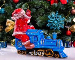 Wooden hand carved Santa Claus Figurine riding a train, Christmas home decor