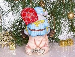 Wooden hand carved Santa Claus figurine riding a bear, Christmas home decor