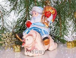 Wooden hand carved Santa Claus figurine riding a bear, Christmas home decor